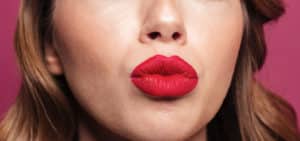 Woman with outing red lips