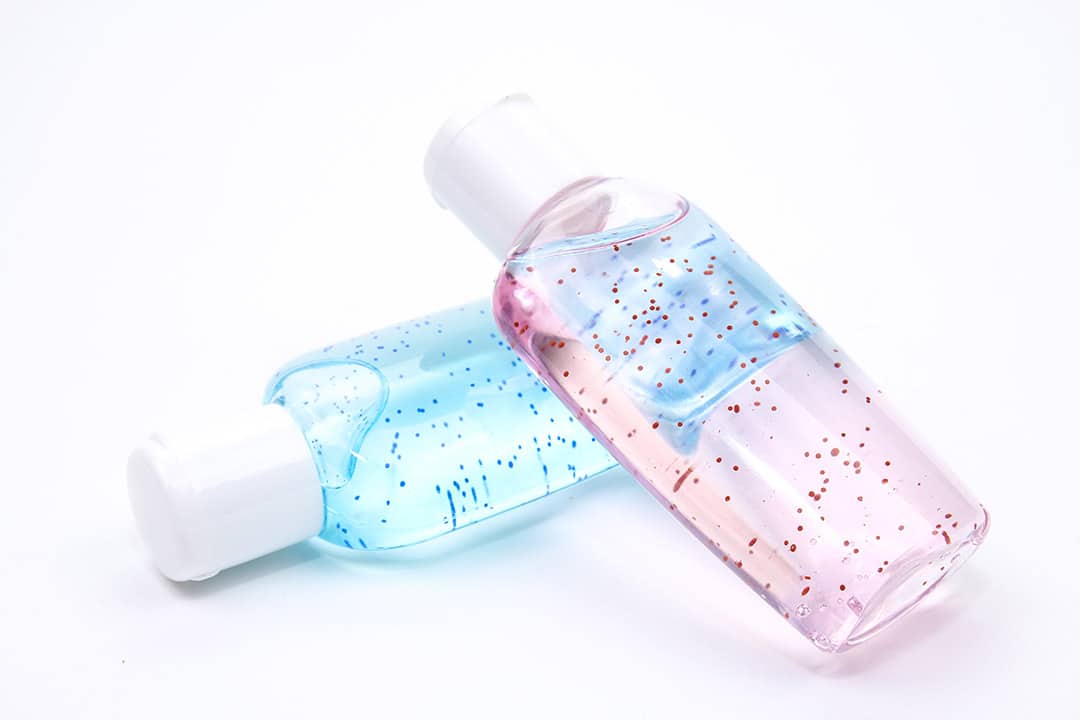 Two bottles with microbeads inside