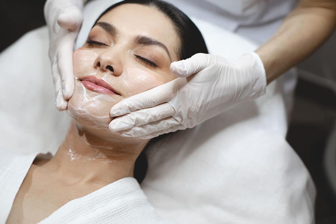 Woman having a facial treatment