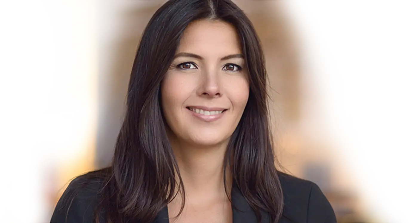 Smiling woman with long dark hair