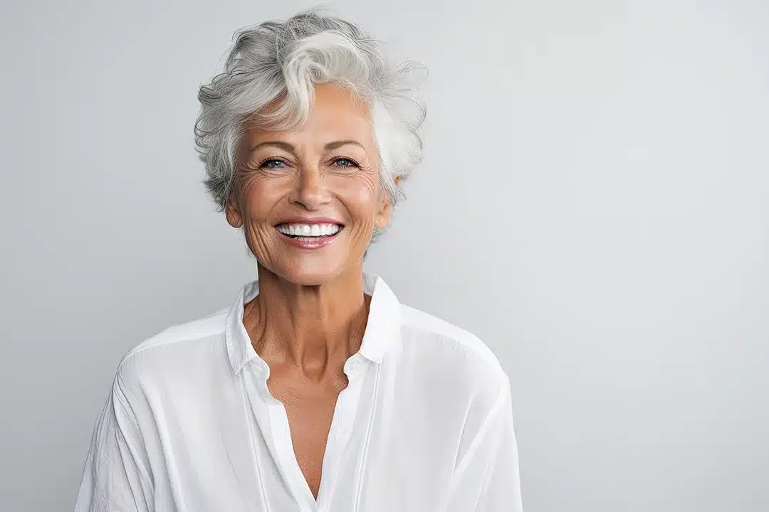 Smiling mature woman with grey hair