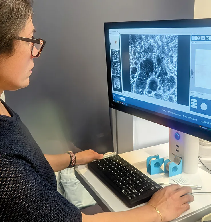 Dr-Mehrnoosh-looking-at-a-confocal-microscopy-scan Dr Mehrnoosh Alian looking at a confocal microscopy scan